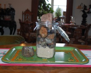 Starting with the easy sand, then pebbles and finally the rocks, I can't fit it all in.