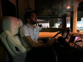 Me, driving a parked motorhome. (From Switzerland to Buenos Aires)