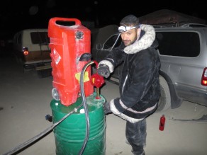 4am, pumping gas. (Burning Man 2015)